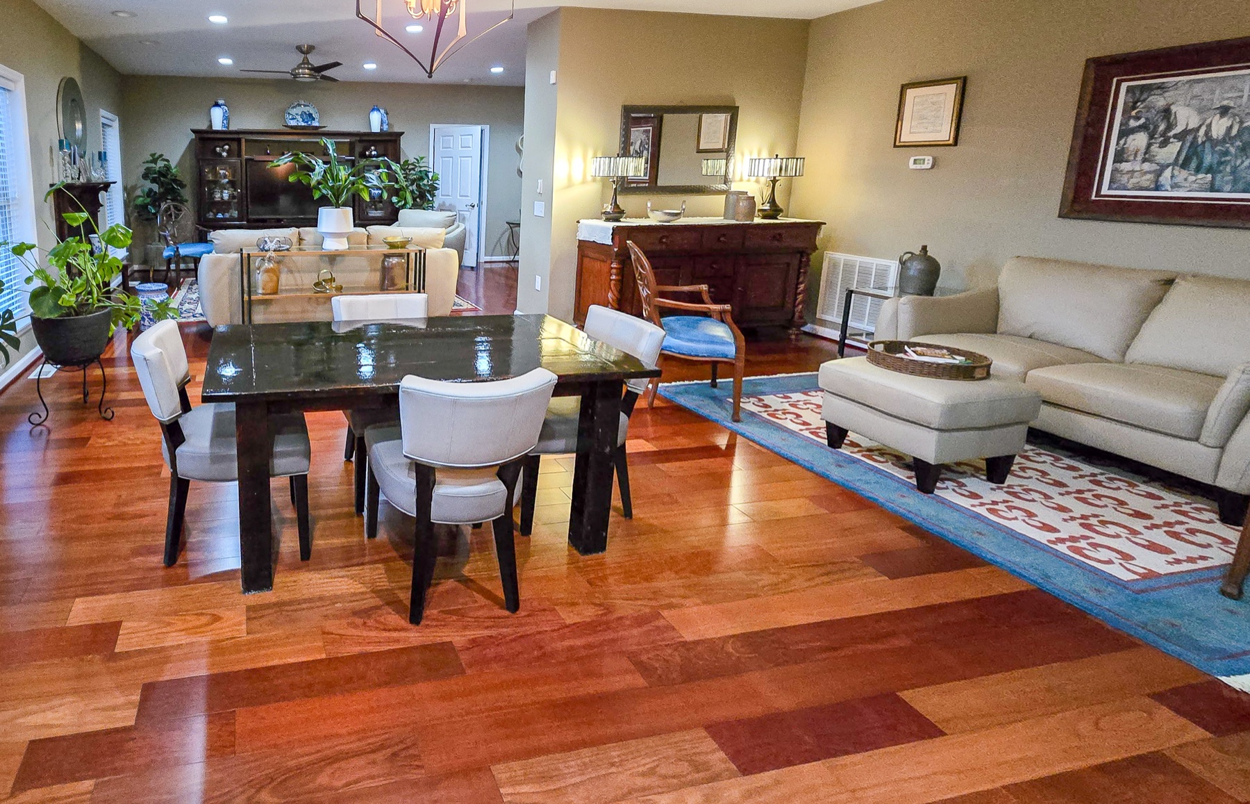 Finished custom farmhouse table in an open-plan dining and living room